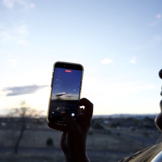 Capturing the Desert Sunset Through a Phone Screen