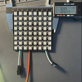 Compact Electronic Board with Digital Display and Battery