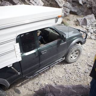 Adventurous Camper on a Pickup Truck