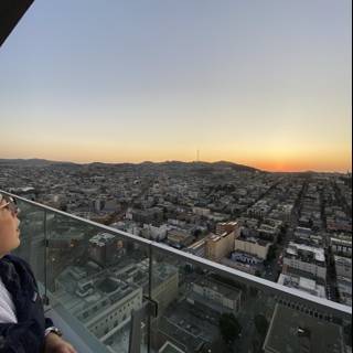 Urban sunset selfie from a San Francisco balcony