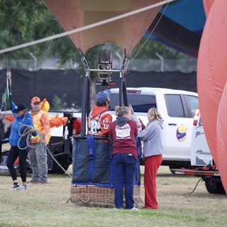 Ground Crew Prepares Hot Air Balloon for Launch