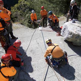 Orange-clad rock climbers