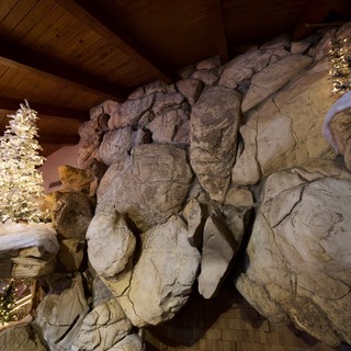 Christmas Grotto with Illuminated Tree and Rock Formation