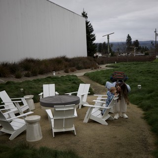 Mother and Child Moment at Modern Winery Firepit