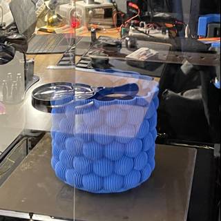3D Printer Creates Blue Laptop Cord Holder