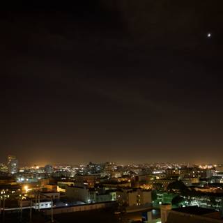 City Metropolis illuminated by Lunar Eclipse
