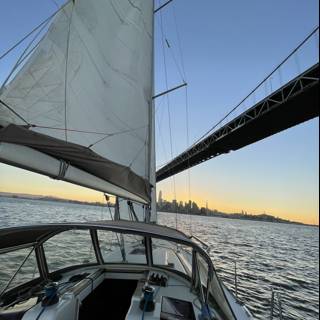 Sailboat at Sunset under San Francisco Bridge