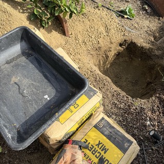 Garden Construction Work with Concrete Mix and Tools
