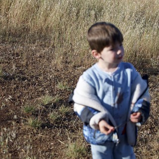Young Boy Exploring Dry Grasslands of Mount Diablo