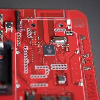 Red Circuit Board Ready to Roll
