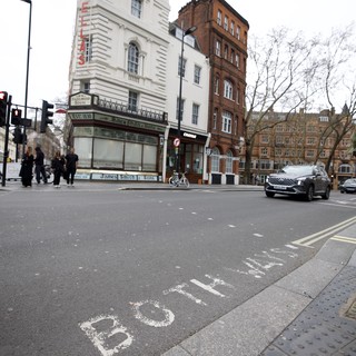 Historic Corner Building on Rainy London Street