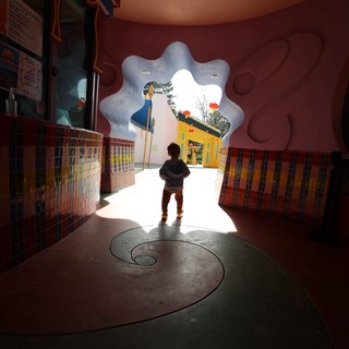 Child Exploring Whimsical Themed Play Space
