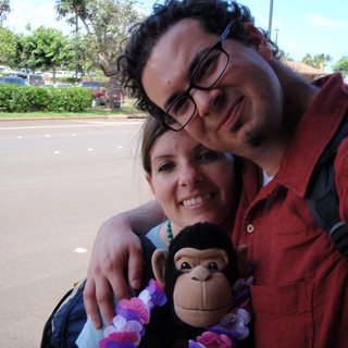 Couple with Monkey Toy at Hawaiian Parking Lot