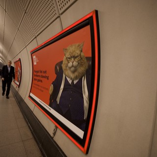 Surreal Cat-Headed Businessman Advertisement in London Underground