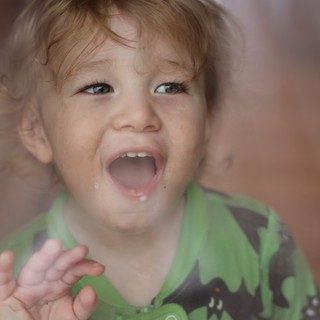 Joyful Toddler with Wide Open Smile