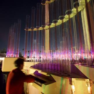 Piano Performance in Front of Illuminated Fountain