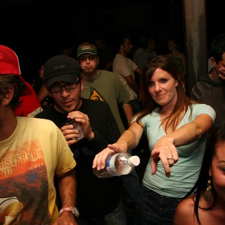 Friends Dancing and Pointing at Night Club Party