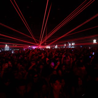 Red Laser Storm Over Massive EDM Festival Crowd
