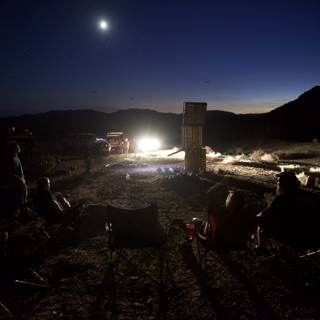 Nighttime Gathering Around the Lunar Flame