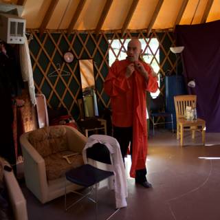 Red Robed Man in a Lavish Living Room