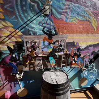 Colorful Street Art Diorama with Miniature Bar Scene