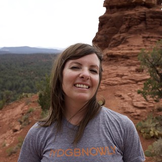 Smiling Hiker Atop Sedona Red Rock Formation