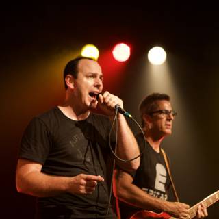Rocking the Crowd: Two Men Perform in Bad Religion Glasshouse Concert