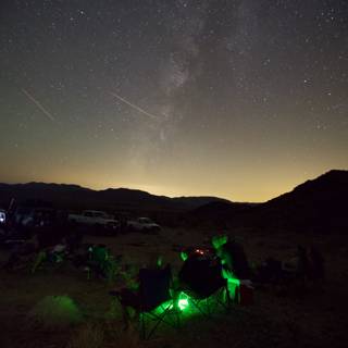 Nighttime Campfire Under the Green Aurora Glow