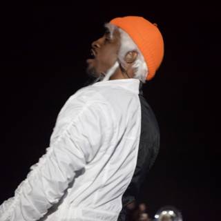 André 3000 Rocks an Orange Cap