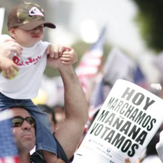 Father and Child with Protest Sign