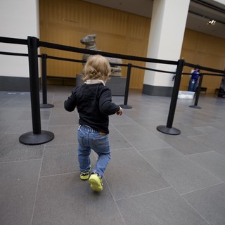 Toddler Exploring Contemporary Art Gallery Space