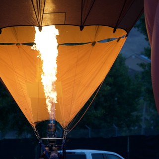Inferno Within: Hot Air Balloon Inflation at Dawn