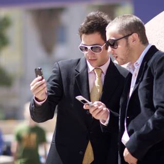 Businessmen Checking their Phones