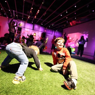 Children Playing at Baby Rave Event in Museum