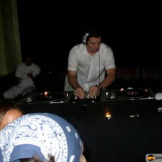 DJ spinning tracks in urban nightclub