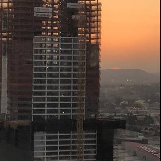 Urban Sunset Over High-Rise Construction