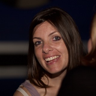 Joyful Woman Sharing a Genuine Smile Indoors