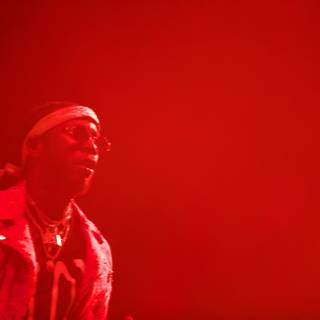 2 Chainz Rocks Out in Maroon Jacket and Glasses