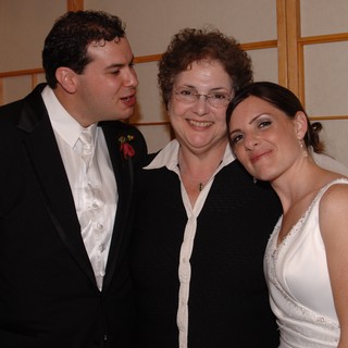 Bride and Groom Celebrate with Family at Wedding Reception