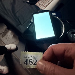 Transit Ticket Number 482 in Dimly Lit Setting
