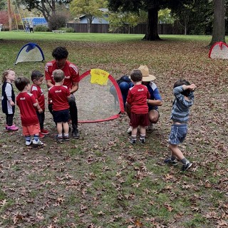 Youth Soccer Practice with Pop-Up Goals in Autumn Park