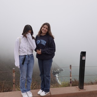 Friends Posing in Foggy Coastal Setting