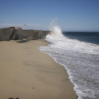 Epic Wave Crashing Against a Rocky Shore