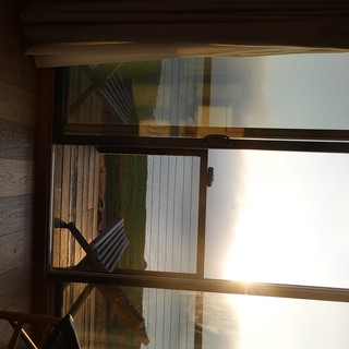 Sunrise Ocean View Through Glass Doors