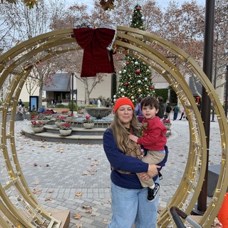 Mother and Child in Holiday Decorated Park
