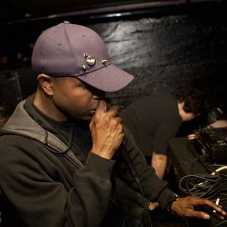 Ryan Frazier, the Deejay, Holding the Mic at Pure Filth