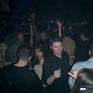 One Person in a Nightclub Crowd