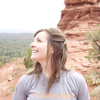 Joyful Woman Gazing Up at Sedona Red Rocks