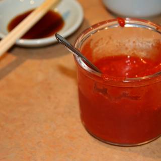 Red Sauce Served with Utensils