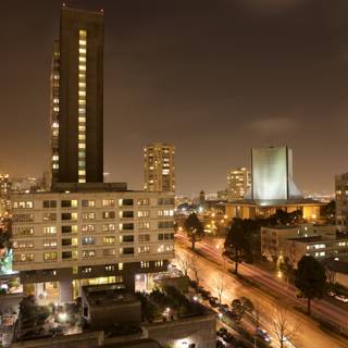 Nighttime Cityscape with High Rise Buildings and Cars